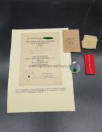 Ostmedaille mit Verleihungstüte und Urkunde, Hst. 18 - "Karl Wurster KG, Markneukirchen", Winterschlacht im Osten 1941/42
