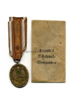 Schutzwall Ehrenzeichen und Verleihungstüte, Hst. Carl Poellath Schrobenhausen