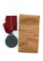 Ostmedaille mit Tüte, Winterschlacht im Osten 1941/42 (Hst. 76 – Ernst L. Müller, Pforzheim) – Bild 2