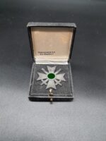 Kriegsverdienstkreuz 1. Klasse mit Schwertern, Hst. 65, im Etui Klein & Quenzer