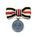 Preussen. 1870/71. Kriegsdenkmünze für Nichtkämpfer (Stahl) an Damenschleife