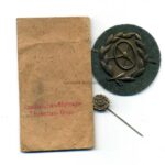 Kraftfahrbewährungsabzeichen in Bronze mit Tüte und Miniatur