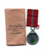 Ostmedaille mit Verleihungstüte, Hst. 6, Winterschlacht im Osten 1941/42