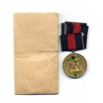 Medaille zur Erinnerung an den 1. Oktober 1938 (Sudetenland-Medaille) mit Verleihungstüte, Hst. Adolf Besson Metallwarenfabrik, Schwäb.Gmünd