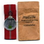 Ostmedaille mit Verleihungstüte, Hst. 14 – "Christian Lauer, Nürnberg”, Winterschlacht im Osten 1941/42
