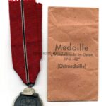 Ostmedaille mit Verleihungstüte, Hst. 19 – “E. Ferdinand Wiedmann, Frankfurt”, Winterschlacht im Osten 1941/42
