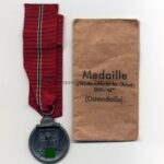 Ostmedaille mit Verleihungstüte, Hst. 1, Winterschlacht im Osten 1941/42