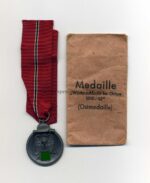 Ostmedaille mit Verleihungstüte, Hst. 1, Winterschlacht im Osten 1941/42