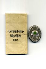 Verwundetenabzeichen 1939 in Silber mit Verleihungstüte Hst. 30 (Hauptmünzamt Wien)