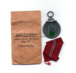 Ostmedaille mit Verleihungstüte, Hst. 28, Winterschlacht im Osten 1941/42
