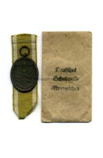 Schutzwall Ehrenzeichen und Verleihungstüte, Hst. Carl Poellath Schrobenhausen