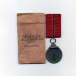 Ostmedaille mit Verleihungstüte, Hst. 6, Winterschlacht im Osten 1941/42