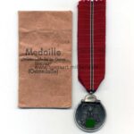 Ostmedaille mit Verleihungstüte, Hst. 127- "Moritz Hausch A.G., Pforzheim", Winterschlacht im Osten 1941/42