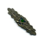 Nahkampfspange in Bronze Ausf. A.G.M.u.K. Gablonz mit blauer Platte, Mint