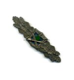 Nahkampfspange in Bronze Ausf. A.G.M.u.K. Gablonz mit blauer Platte, Mint