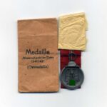 Ostmedaille, Winterschlacht im Osten 1941/42 (Hst. 66 – Friedrich Keller, Oberstein) mit Tüte