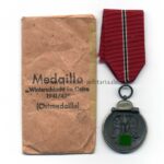 Ostmedaille, Winterschlacht im Osten 1941/42 (Hst. 66 – Friedrich Keller, Oberstein) mit Tüte