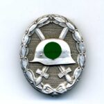 Verwundetenabzeichen Silber Hst. 30 (Hauptmünzamt Wien), breite Nadel