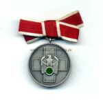 Volkspflegemedaille an Damenschleife