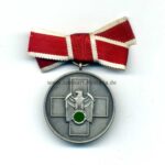 Volkspflegemedaille an Damenschleife