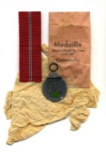 Ostmedaille mit Verleihungstüte, Winterschlacht im Osten 1941/42 (Hst. 4 - Steinhauer & Lück, Lüdenscheid)
