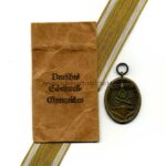 Deutsches Schutzwall-Ehrenzeichen mit Verleihungstüte, Herst. Peter Wilhelm Heb, Lüdenscheid i. W.