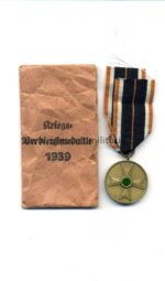 Kriegsverdienstmedaille 1939 mit Tüte, Hst. Klein & Quenzer, Oberstein