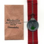 Ostmedaille mit Verleihungstüte, Hst. 20 (L/52!!), Winterschlacht im Osten 1941/42