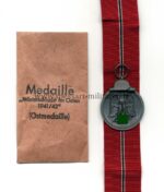 Ostmedaille mit Verleihungstüte, Hst. 20 (L/52!!), Winterschlacht im Osten 1941/42
