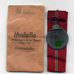 Ostmedaille mit Verleihungstüte, Hst. 3 - "Wilhelm Deumer, Lüdenscheid", Winterschlacht im Osten 1941/42