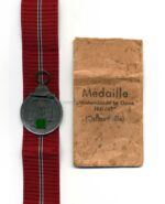 Ostmedaille mit Verleihungstüte, Hst. 26, Winterschlacht im Osten 1941/42
