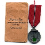 Ostmedaille mit Verleihungstüte, Hst. 109, Winterschlacht im Osten 1941/42