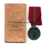 Ostmedaille mit Verleihungstüte, Hst. Metallwarenfabrik Posen, Winterschlacht im Osten 1941/42 -Selten-